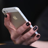 Model shows off her manicure backstage at the Marissa Webb runway show during MADE Fashion Week Fall 2015 at Milk Studios on February 12, 2015 in New...