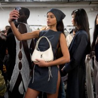 Model takes a selfie backstage prior to the Marcia Womenswear Fall Winter 2023-2024 show as part of Paris Fashion Week on March 01, 2023 in Paris,...