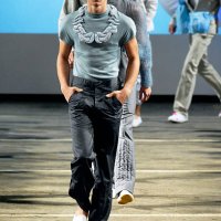 Model walks down the catwalk during the KJ by Kim Jones show during the London Fashion Week 2007 for Spring Summer 08 on September 20, 2007 in...