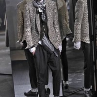 Model walks the runway during the Haider Ackermann Ready to Wear Menswear Fall/Winter 2014-2015 show as part of Paris Fashion Week on January 15,...