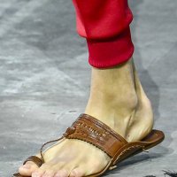 Model walks the runway during the Prada Ready to Wear Spring/Summer 2026 fashion show as part of the Milan Men Fashion Week on June 22, 2025 in...