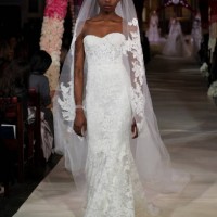 Model walks the runway wearing Reem Acra Bridal on April 11, 2019 in New York City.