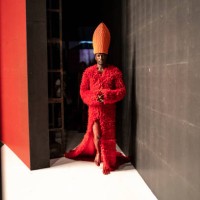 Model wearing a creation by Nigerian designer Oshobor enters the catwalk during the Lagos Fashion Week on October 24, 2024.