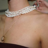Model, wearing Pandora jewellery, prepares backstage ahead of the Pandora's Closing Night show during Australian Fashion Week Presented By Pandora...