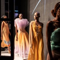 Models leave the catwalk during the Lagos Fashion Week on October 24, 2024.