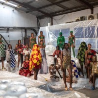 Models pose for a group photo during private fashion show to launch the SS25 collection by Nigerian designer Bubu Ogisi at Iamisigo brand during...