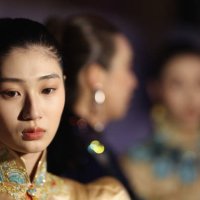 Models prepare backstage before the Loolayy collection show by Chinese designers Zhang Xiaoqi at China Fashion Week A/W 2024 on March 23, 2024 in...