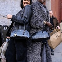 Models Shahnaz Indira and Nyandeng Makur are seenoutside the Coach show during NYFW F/W 2025 on February 10, 2025 in New York City.