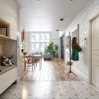 modern hallway with coat hanger, living room, dining table and houseplants - home decoration stock pictures, royalty-free photos & images