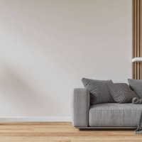 modern interior: a living room with a gray sofa, white and hardwood paneled wall background and decoration - home decoration stock pictures, royalty-free photos & images