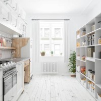 modern kitchen interior with white cabinets and organised pantry items, nonperishable food staples, preserved foods, healthy eating, fruits and vegetables in storage compartment. - food stock pictures, royalty-free photos & i
