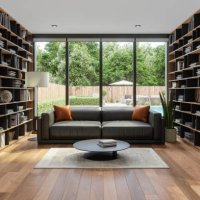 modern living room interior with leather sofa, bookshelf, floor lamp and garden view through the window - garden decoration stock pictures, royalty-free photos & images