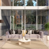 modern loft living room interior with sofa, coffee table, floor lamp and garden view from the window - garden decoration stock pictures, royalty-free photos & images