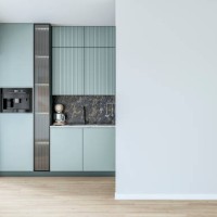 modern powder blue kitchen with large windows (garden view) in the background and a potted plant (ficus) in front of a white blank wall in the foreground - garden decoration stock pictures, royalty-free photos & images