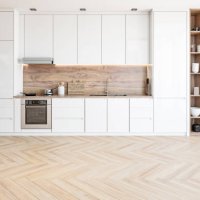 modern white kitchen with rectangular breakfast kitchen island with stools - garden decoration stock pictures, royalty-free photos & images