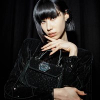 Moon poses backstage at the Philipp Plein fashion show during the Milan Fashion Week Womenswear Fall/Winter 2023/2024 on February 25, 2023 in Milan,...