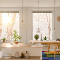 morning sun streaming into the kitchen, winter scene - home decoration stockfoto's en -beelden