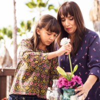 mother and daughter arranging flowers in a vase - garden decoration stock pictures, royalty-free photos & images