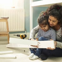 mother and daughter building furniture - home decoration stock pictures, royalty-free photos & images