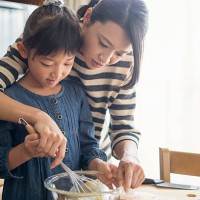 mother and daughter making cookies together - food stock pictures, royalty-free photos & images