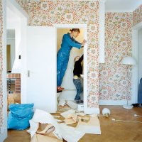 mother and son renovating bathroom - home decoration stock pictures, royalty-free photos & images