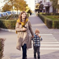 mother and son walking city street - junk food stock pictures, royalty-free photos & images