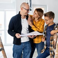 mother, father and son are talking about the changes during the home renovation - home decoration stock pictures, royalty-free photos & images