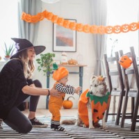 mother helping baby to walk on halloween - home decoration stock pictures, royalty-free photos & images
