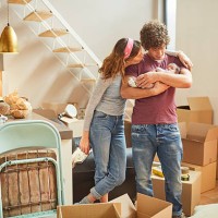 moving home new beginnings. couple with baby. - home decoration stock pictures, royalty-free photos & images