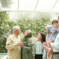 multi-generation family enjoying celebrating birthday - garden decoration stock pictures, royalty-free photos & images