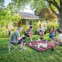 multi-generation family reunion, multiracial japanese picnic at home garden - junk food stock pictures, royalty-free photos & images
