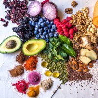 multi colored vegetables, fruits, legumes, nuts and spices on wooden table - food stock pictures, royalty-free photos & images