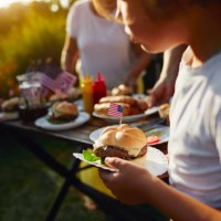 multi generations family celebrating 4th of july - food stock pictures, royalty-free photos & images