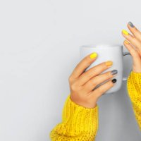 multicolored manicure with yellow and gray nails on light background. trendy colors of the year. - nails art stock pictures, royalty-free photos & images