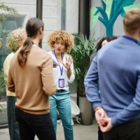 multiethnic business people talk during a coffee break - food stock pictures, royalty-free photos & images