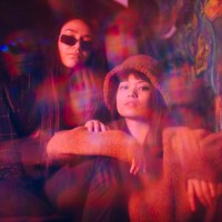 multiple exposure of young female friends sitting together at illuminated restaurant - fashion stock pictures, royalty-free photos & images