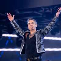 Munich, Germany, : Robbie Williams during his performance at the concert One Show and One Night only of Robbie Williams at Messe Munich on August...