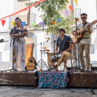 music band performing at an outdoor stage on the street. - concert stock pictures, royalty-free photos & images