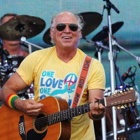 Musician Jimmy Buffett performs onstage at Jimmy Buffett & Friends: Live from the Gulf Coast, a concert presented by CMT at on the beach on July 11,...