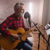 musician recording a new song in the studio - concert stock pictures, royalty-free photos & images