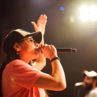 musician singing with microphone on stage - concert stock pictures, royalty-free photos & images