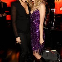 Musicians Hillary Scott of the band Lady Antebellum and Taylor Swift pose backstage during Brooks & Dunn's The Last Rodeo Show at the MGM Grand...
