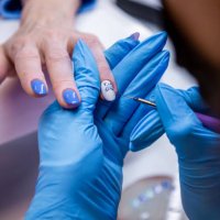 nail technician doing nail art at her home nail salon - nails art stock pictures, royalty-free photos & images
