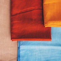 natural vibrant linen cloth fabric textile background. top view. flat lay, copy space. - fashion stock pictures, royalty-free photos & images