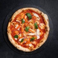neapolitan pizza on black background - junk food stock pictures, royalty-free photos & images