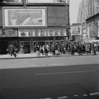 Nedicks fast food restaurant on the corner of 7th Avenue and West 42nd Street in Midtown Manhattan, New York City, 1964. The Victory Theater is on...