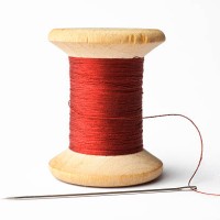 needle and red line - fashion stock pictures, royalty-free photos & images