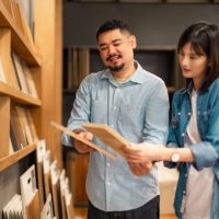 new home choices.couple at a furniture or material store looking at different options on the retail display . - home decoration stock pictures, royalty-free photos & images