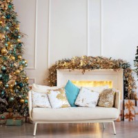 new year's room decor with a fireplace and a christmas tree. new year. christmas. family celebration. family hearth. - home decoration stock pictures, royalty-free photos & images