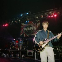 Noel Gallagher of British rock group Oasis live at the Astoria in London, 19th August 1994.